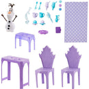 Elsa Ice Castle playset by Mattel includes Olaf figure, purple table, two chairs, and various food accessories.