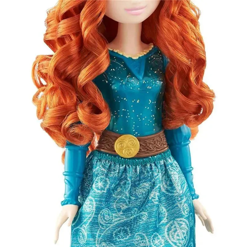 Disney Princess Merida doll with long curly red hair, wearing a blue dress and a decorative belt.