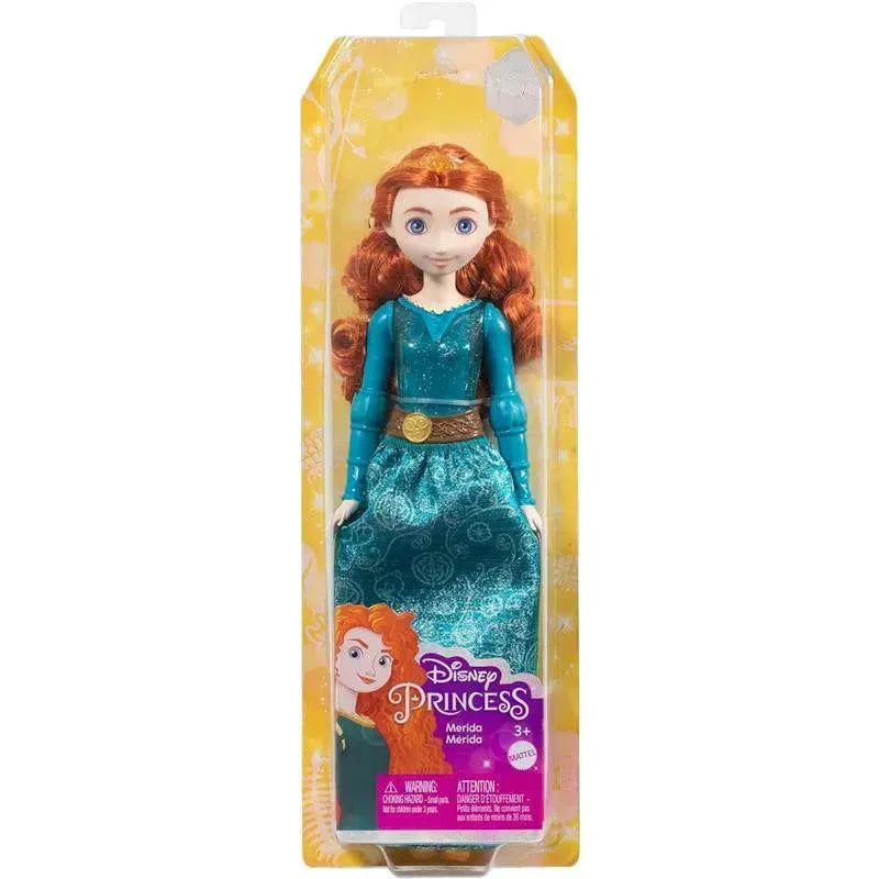 Disney Princess Merida doll with red hair and green dress in packaging, featuring a warning label and branding.