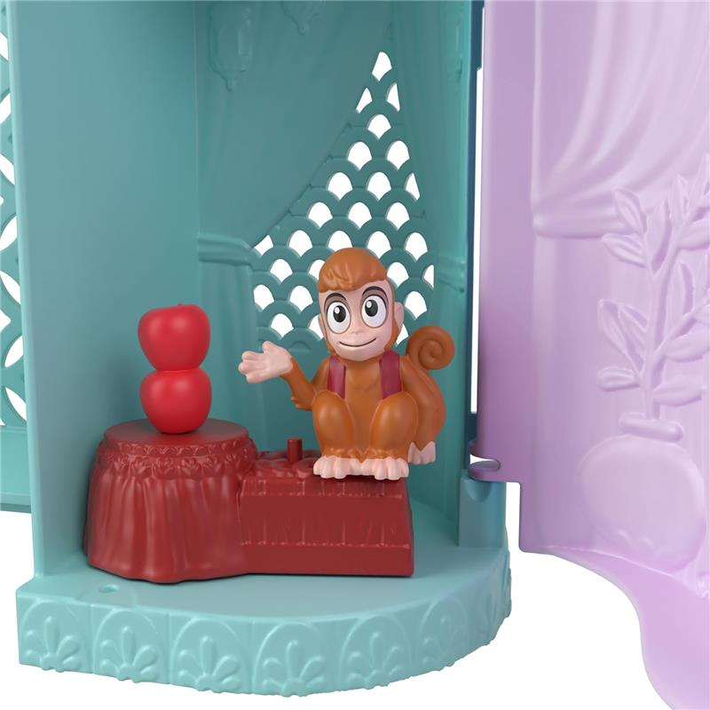 Colorful Disney Princess Stacking Castle playset features a monkey figurine with two red apples on a decorative stand.