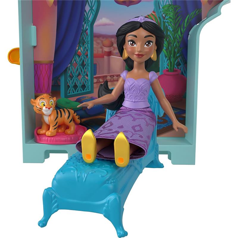 Jasmine doll from Disney Princess, sitting on a light blue chaise lounge with a tiger figurine in the background.