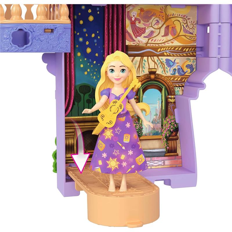 Disney Princess Stacking Castle set featuring Rapunzel doll with a guitar, standing on a removable base inside a colorful castle backdrop.