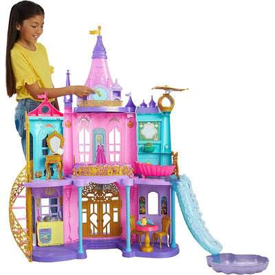 Disney Princess Ultimate Castle, 4 feet tall with lights and sounds, featuring a colorful design and a girl interacting with it.