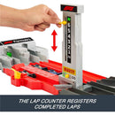 Hot Wheels F1 Grand Prix track set featuring a hand adjusting a lap counter displaying completed laps, with vibrant track elements.