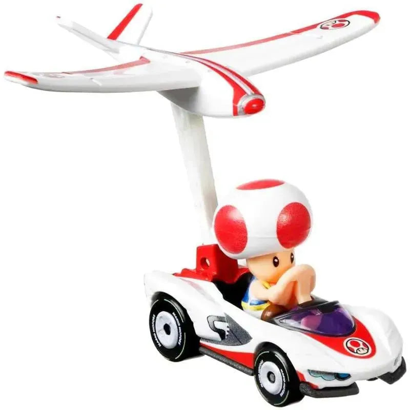 Toad character in a white and red glider kart, ready for action in the Mario Kart Gliders series by Mattel.