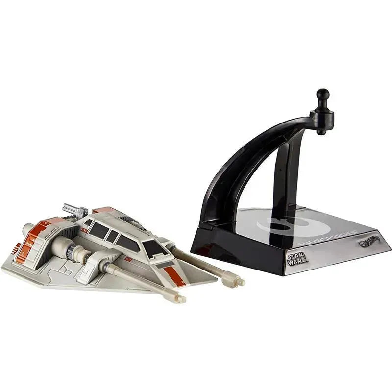 Premium diecast Star Wars Snowspeeder model with a display stand, featuring intricate detailing and orange accents.