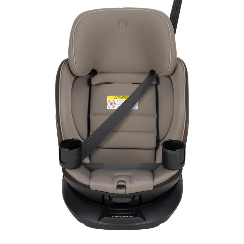 Maxi-Cosi Andi 360 rotating all-in-one convertible car seat in Truffle color, featuring a safety strap and cup holders.