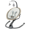 Maxi-Cosi Cassia Swing in Classic Green, featuring a soft, cushioned seat and a mobile with plush owl and bunny toys.