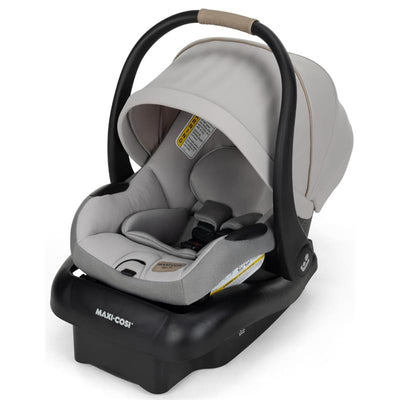 Maxi-Cosi Mico Pro Infant Car Seat in Sea Drift color, featuring a cushioned interior, adjustable canopy, and safety harness.