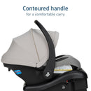Maxi-Cosi Mico Pro Infant Car Seat in Sea Drift color, featuring a contoured handle for comfortable carrying and safety labels.