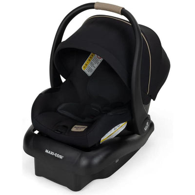 Maxi-Cosi Mico Pro Infant Car Seat in Sea Shadow color with a sleek black design and a beige handle.