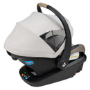 Maxi-Cosi Mico Pro + Infant Car Seat in Sea Shadow color, featuring a canopy, safety harness, and base with adjustment controls.