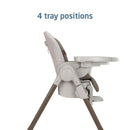 Maxi-Cosi Minla 6-in-1 high chair in truffle color, featuring an adjustable design with four tray positions.
