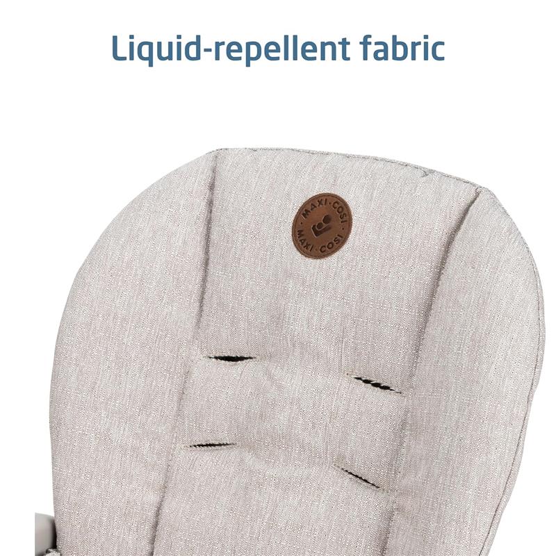 Maxi-Cosi Minla high chair cushion in truffle color with liquid-repellent fabric and logo detail.
