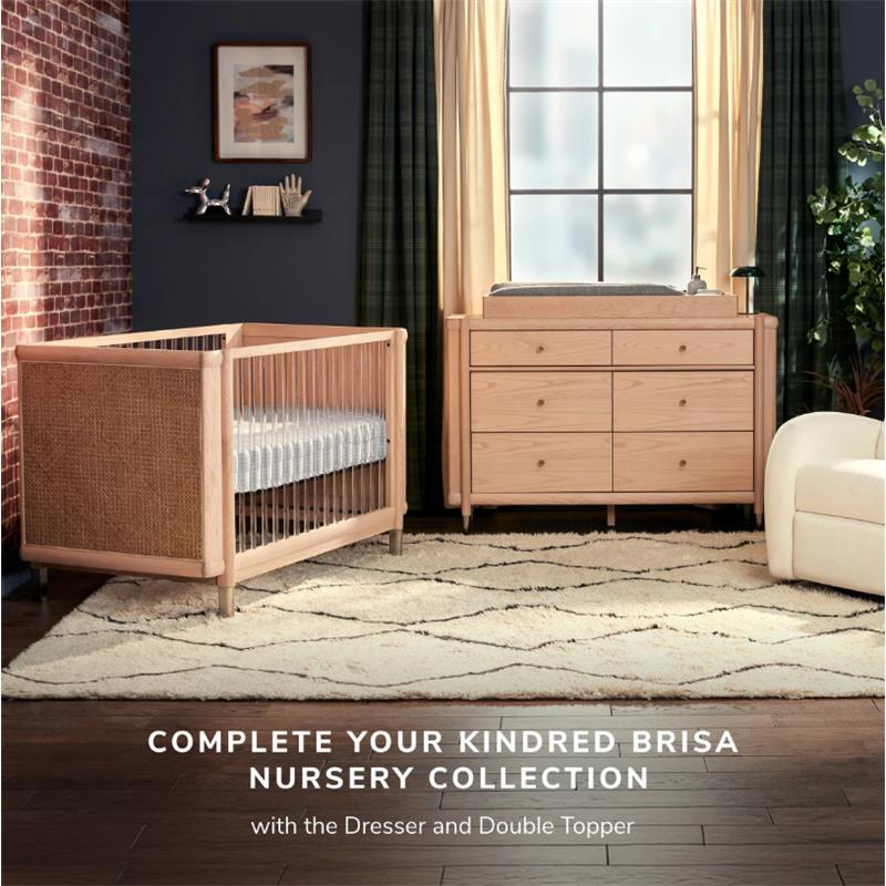Maxi-Cosi Nursery Brisa 4-in-1 Convertible Crib with a natural wood finish, featuring a mattress, and a matching dresser with changing topper.