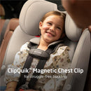 Maxi-Cosi Pria Max All-in-One Convertible Car Seat in Escargot with a smiling child using the ClipQuik Magnetic Chest Clip.