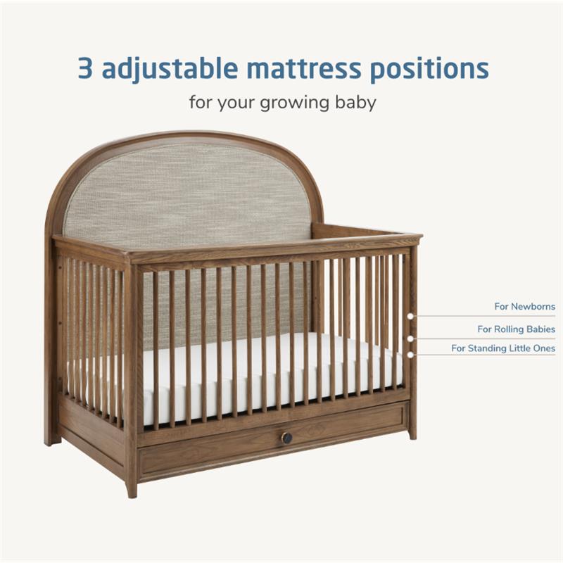 Maxi Cosi Quiet Luxury 6-in-1 Convertible Crib featuring three adjustable mattress positions for newborns, rolling babies, and standing toddlers.