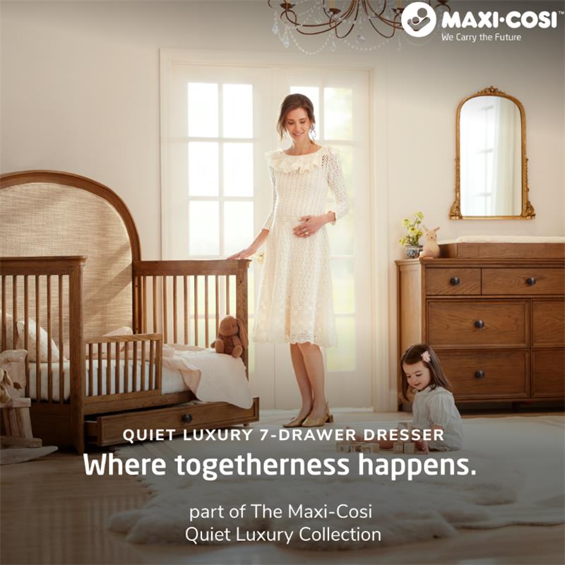 Maxi Cosi Quiet Luxury 7-Drawer Dresser in a serene nursery setting, featuring a pregnant woman and a girl beside a crib.