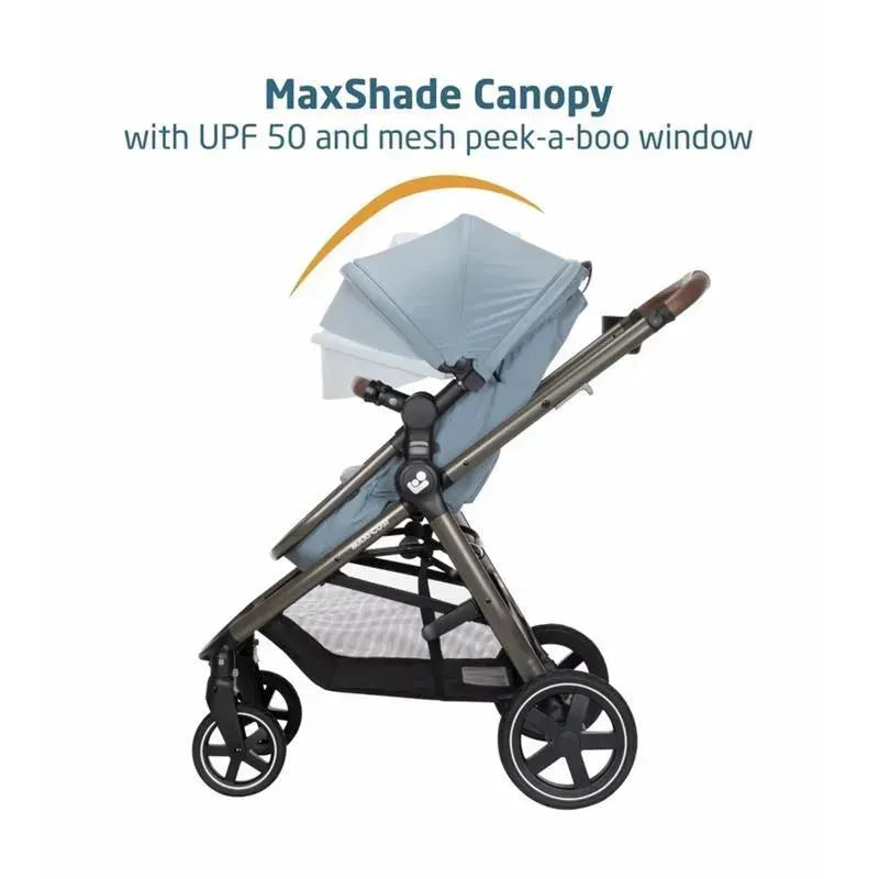 Maxi-Cosi Zelia 2 Luxe 5-in-1 modular travel system in New Hope Grey with MaxShade canopy and peek-a-boo window.