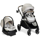 Maxi-Cosi Zelia Pro 5-in-1 Travel System in Classic Oat, featuring a stroller and infant car seat, both in soft beige and white.