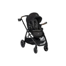 Maxi-Cosi Zelia2 Luxe 5-in-1 Modular Travel System in New Hope Black, featuring a stroller with a canopy and adjustable handle.
