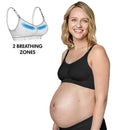 Maternity and nursing bra featured in black, worn by a smiling pregnant woman, highlighting two breathing zones.