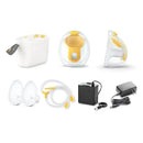 Medela Pump in Style Hands-Free Breast Pump components, including the pump unit, connectors, breast shield, and power adapter.