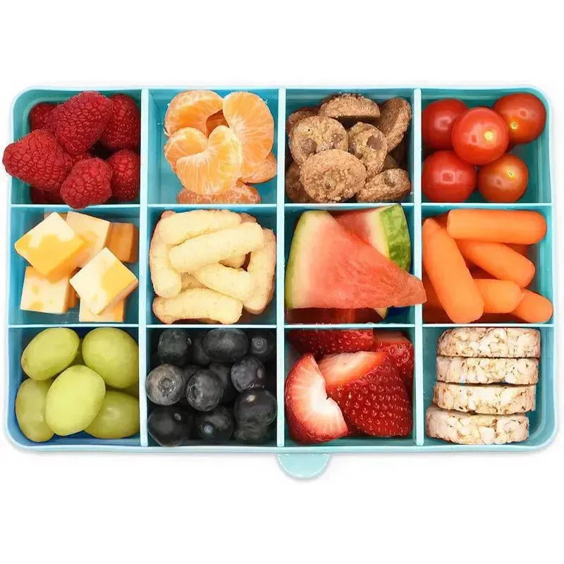 Twelve compartment snack container in blue with assorted fruits, vegetables, and snacks neatly arranged inside.