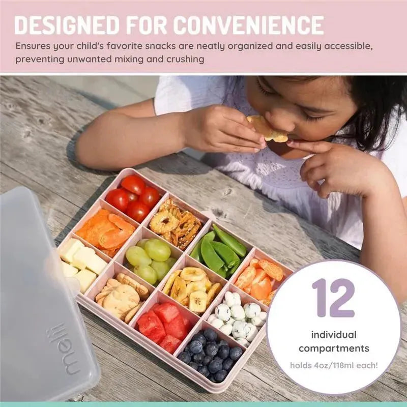 Melii snack container with 12 compartments filled with assorted snacks, beside a child eating a snack.