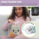 Reusable sandwich and snack bags featuring cat and unicorn designs, with a girl happily holding one bag of snack sticks.