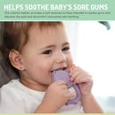 Colorful silicone teether featuring a cat design, being used by a baby to soothe sore gums while teething.