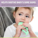 Colorful dinosaur-shaped teether held by a toddler, designed to soothe sore gums during teething.