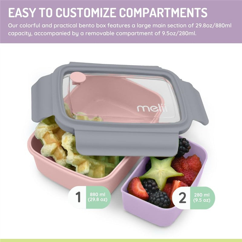 Bento box in pink, purple, and grey with removable compartments; includes waffles and mixed fruit inside. 800ml capacity.