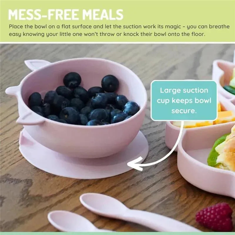 Silicone suction bowl in unicorn pink with blueberries, designed for mess-free feeding. Features a large suction cup for stability.