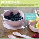 Silicone suction bowl in unicorn pink with blueberries, designed for mess-free feeding. Features a large suction cup for stability.