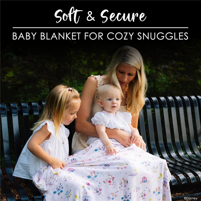 Soft and secure baby blanket featuring colorful floral patterns, used by a mother with two young daughters outdoors.