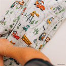Milk Snob Disney and Pixar Cars Baby Sleep Bag featuring colorful characters and a Radiator Springs theme, suitable for babies 0–6 months.