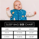 Baby wearing a blue Milk Snob sleep bag featuring Finding Nemo characters; size chart displayed below.