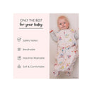 Baby wearing a Disney-themed sleep bag with floral patterns, featuring safety, breathability, and machine washability details.