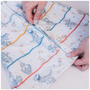 Milk Snob Toy Story baby sleep bag with playful character designs, featuring a zipper for easy use, suitable for 0–6 months.