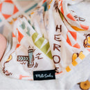 Milk Snob Marvel World lovey baby security blanket featuring colorful hero-themed designs and the brand label.