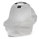 Multifunctional Milk Snob cover in heather stripe design, draped over a car seat, showcasing its use and style.