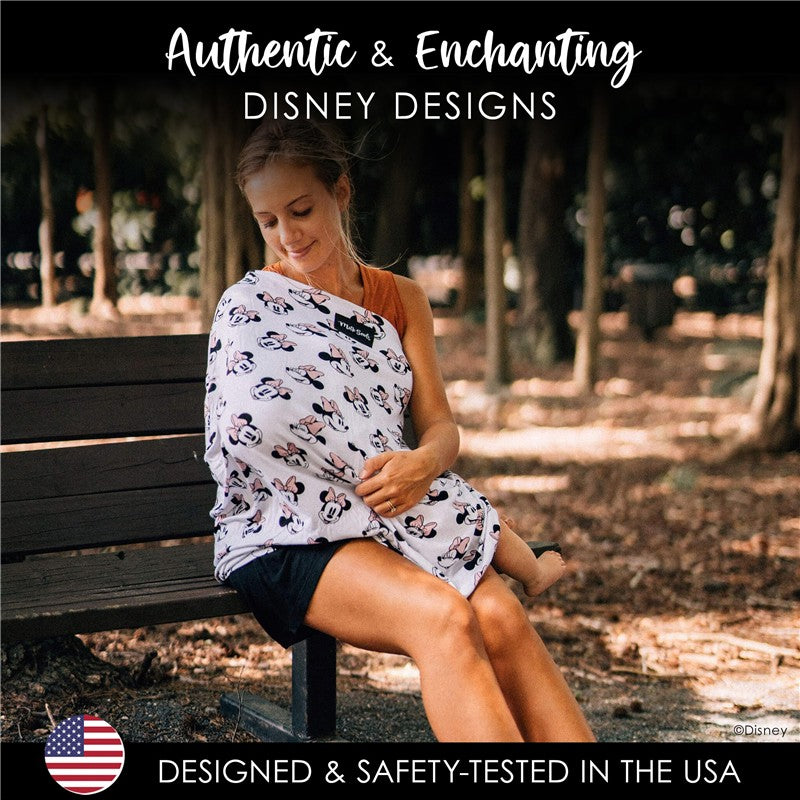 Minnie Mouse 5-in-1 multifunctional cover displayed on a woman sitting on a bench in a park setting.