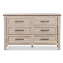 Monogram Beckett 6 Drawer Double Dresser in Sandbar finish, featuring six spacious drawers with sleek dark handles.