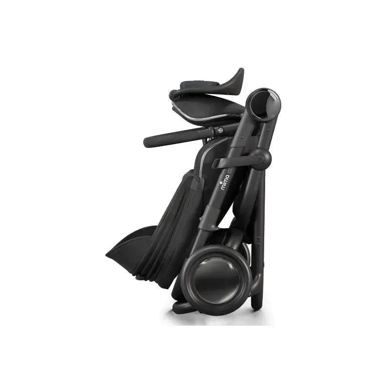 Mima Creo Single Stroller in black, shown in a compact, folded position, highlighting its sleek design and features.