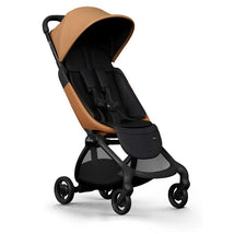 Mima Miro Compact Stroller features a black chassis with a mocha cream seat, designed for comfort and style.