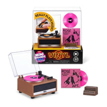 Mini Brands Really Works Vinyl Playset by ZURU featuring a miniature turntable, pink vinyl record, and album cover.