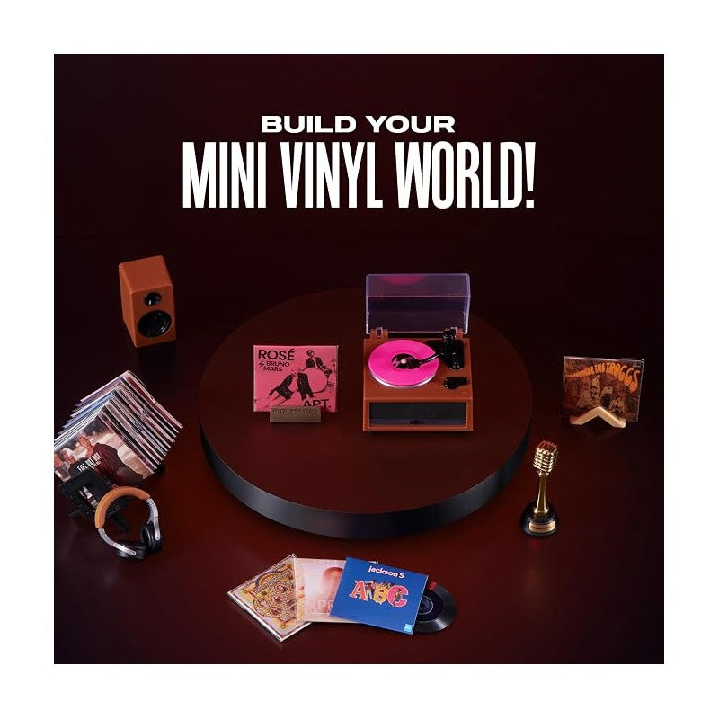 Mini Brands Really Works Vinyl Playset Series 1 features a toy record player with pink vinyl, music albums, and a microphone.