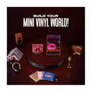 Mini Brands Really Works Vinyl Playset Series 1 features a toy record player with pink vinyl, music albums, and a microphone.