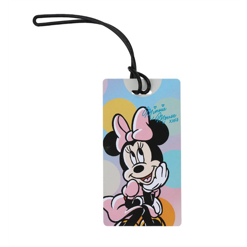 Minnie Mouse luggage tag featuring a smiling Minnie in a pink dress and bow, against a colorful polka dot background.
